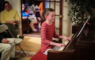 Girl at piano by adwriter