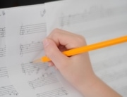 Student hand composing_Larger